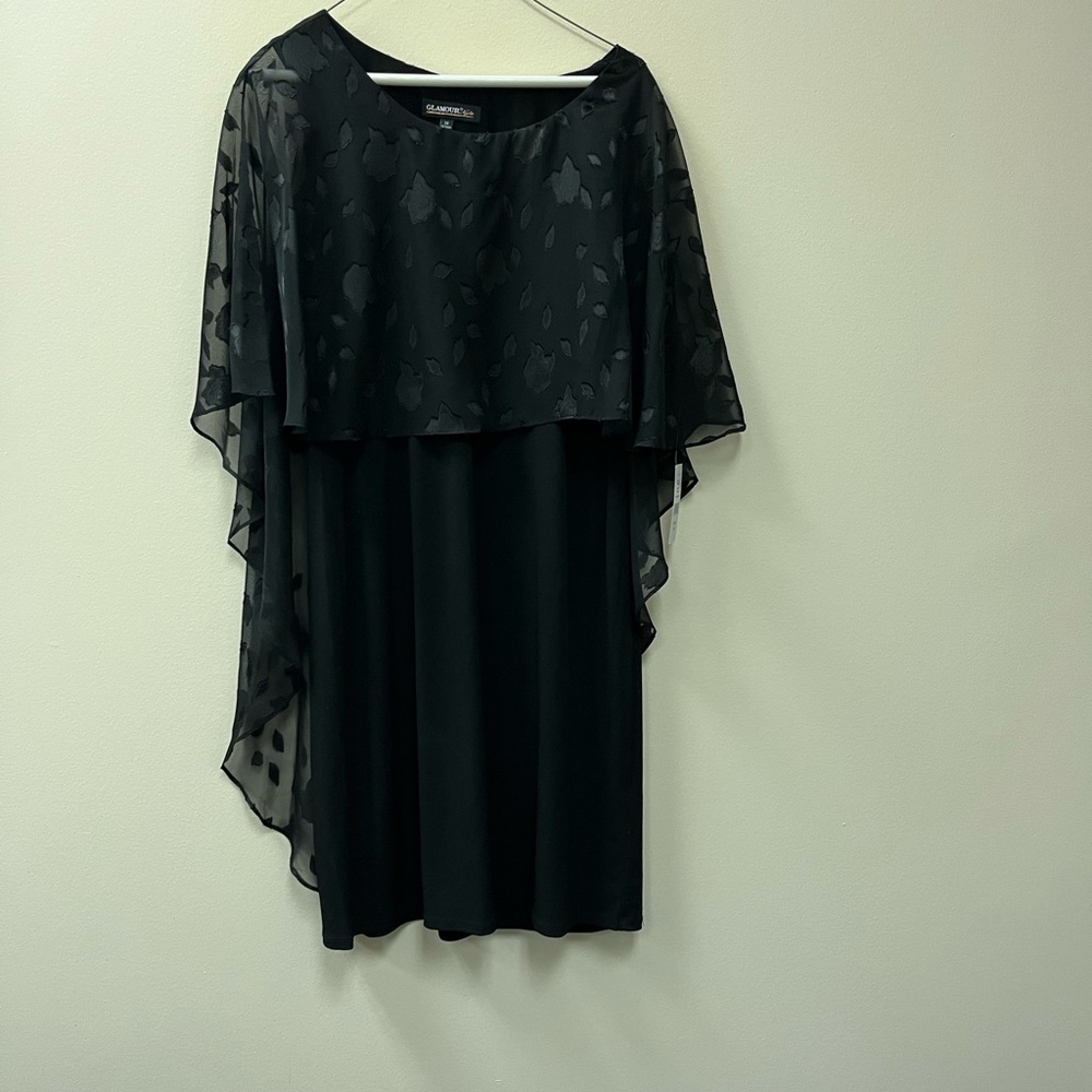 Black flattering-goes over head- no zippers